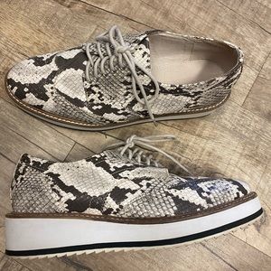 Snakeskin shoes.